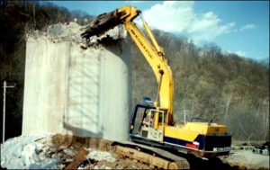 Demolition of Base Using Mechanical Shear Mounted on Excavator