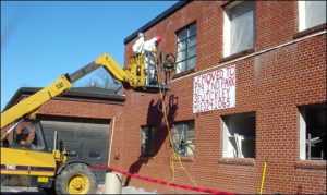 Removal of asbestos-containing window systems, exterior view